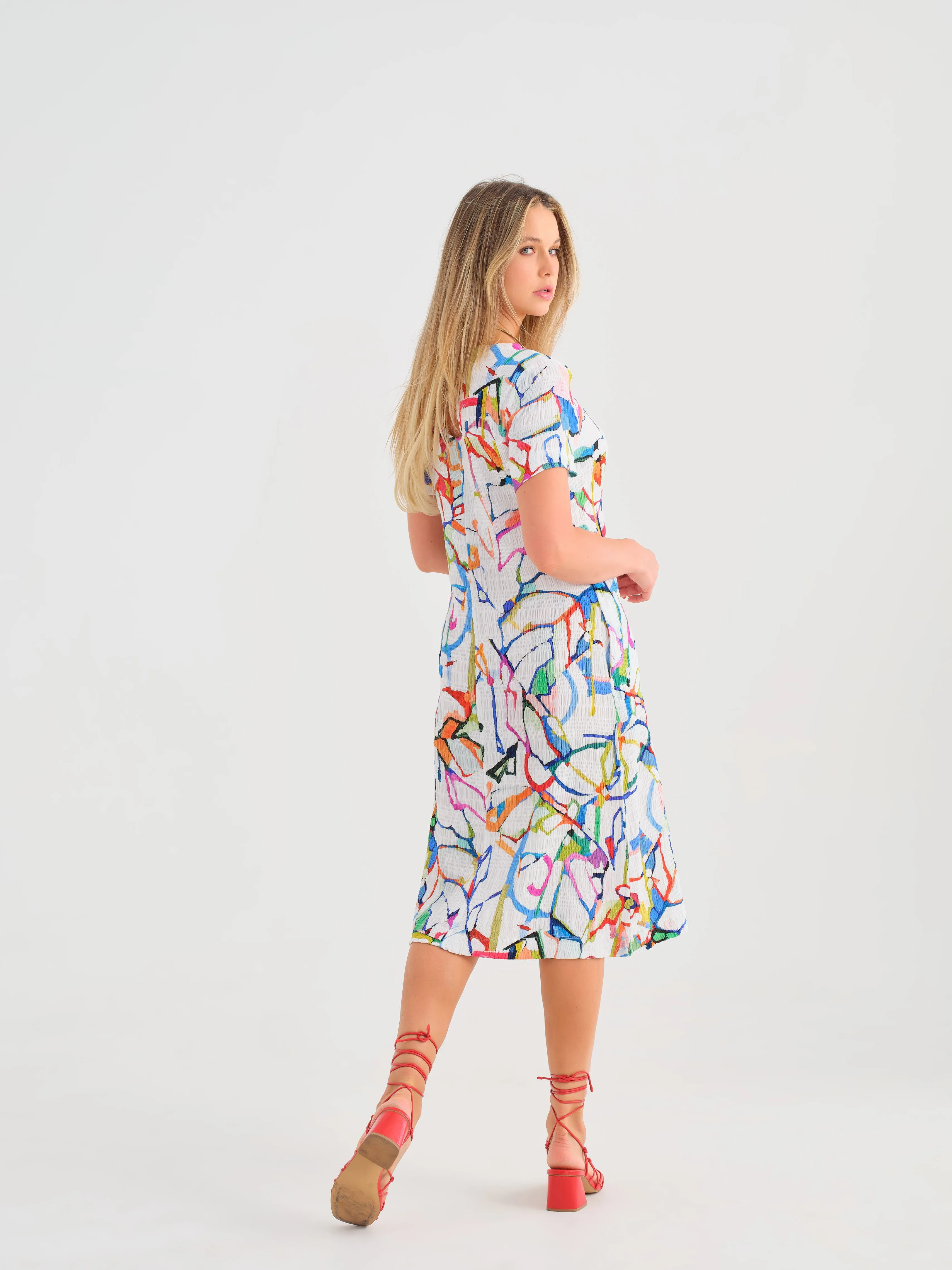 Abstract Print Dress with V-Neck and Pockets
