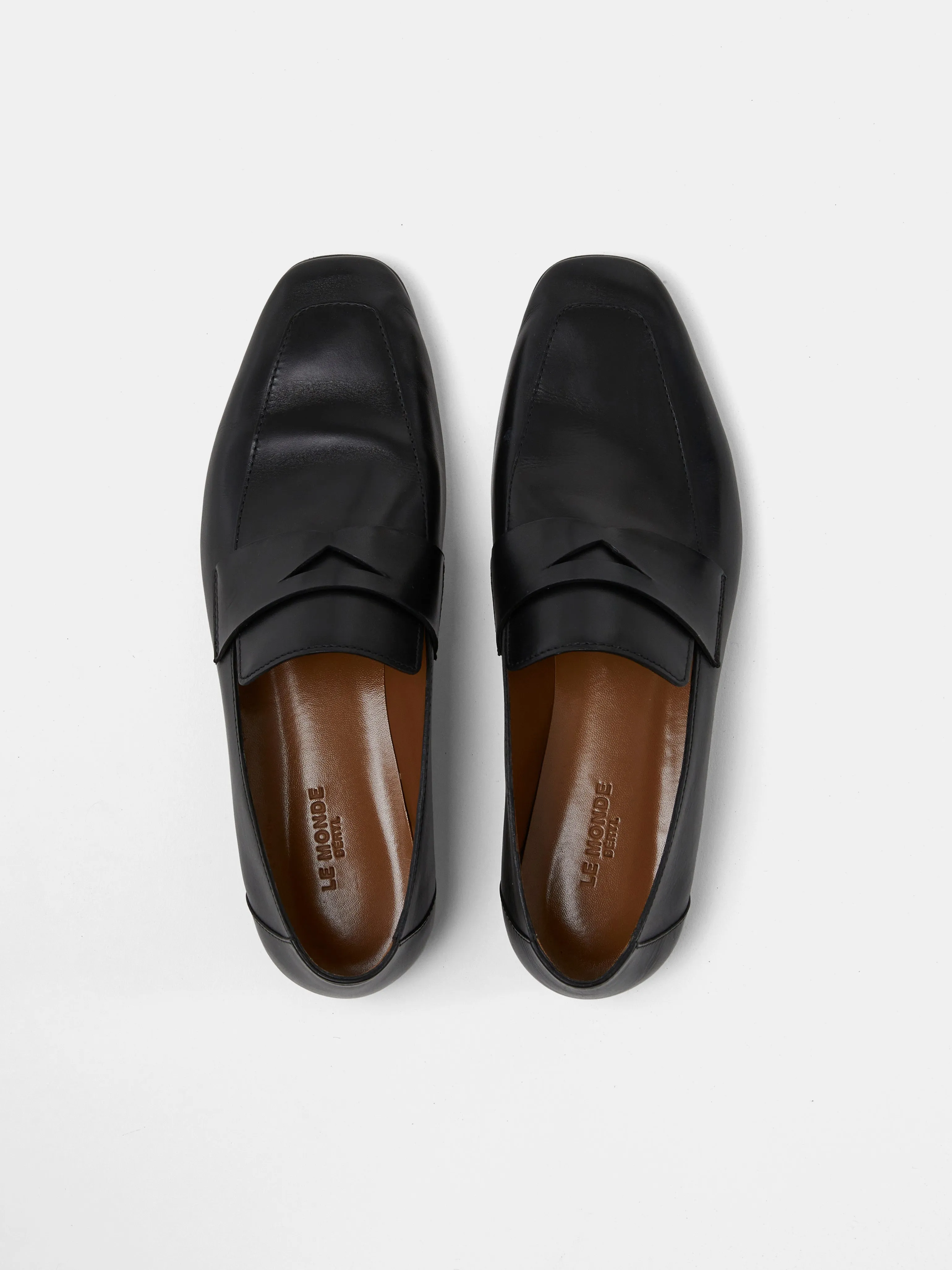 Black placket leather soft loafers